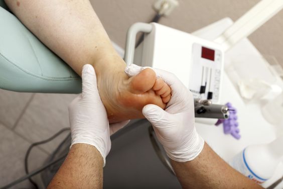 Doctor examine the patient's foot