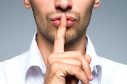 Someone make a silent reaction with his toe on his mouth